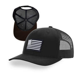 Black Fieldwar DRY-CORE adjustable mid-profile trucker hat Designed to prevent sweat stains with moisture-repelling technology; one-size-fits-most with breathable mesh back and structured front panel.  with  Black and White Rubber American Flag Patch.