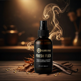 Beard Bro Fresh Flex hair and beard spray bottle with tobacco and vanilla elements on a wooden surface.